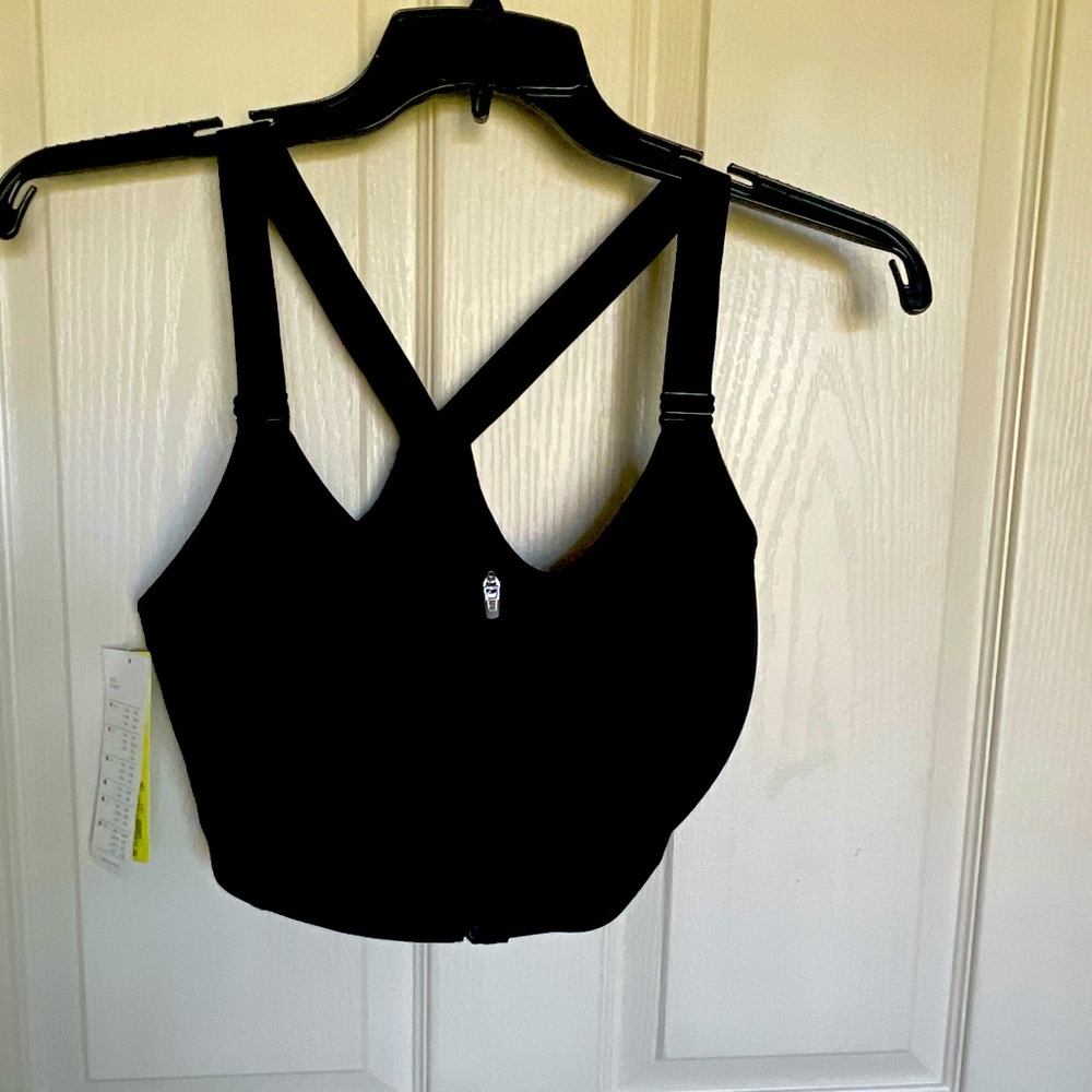 Black front zip high support sports bra.